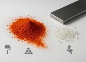 Macro of red-shade yellow pigment powder with resin chips and a drawdown bar, representing PY83 applications in inks, plastics, and coatings.
